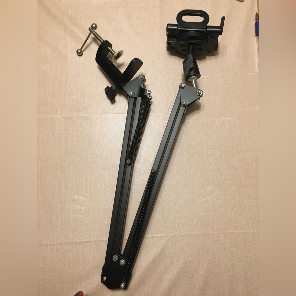 A mobile phone cantilever stand
